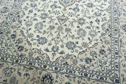 Close-up detail of 2000s Kashan rug from Iran / Persia showing Wool weave