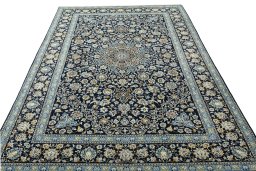 Surface texture of 2000s Kashan rug with natural Wool and intricate pattern