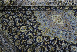 Close-up detail of 1970s Kashan rug from Iran / Persia showing Wool weave