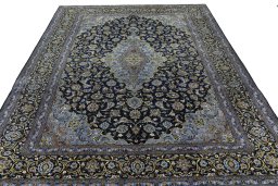 Surface texture of 1970s Kashan rug with natural Wool and intricate pattern