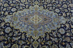 Central medallion detail of 1970s Kashan rug from Iran / Persia