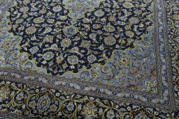 Close-up detail of 1970s Kashan rug from Iran / Persia showing Wool weave