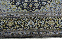 Full view of 1970s Kashan rug from Iran / Persia, 400 × 300 cm in Blue tones