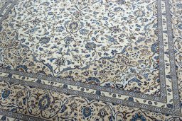 Close-up detail of 2000s Kashan rug from Iran / Persia showing Wool weave