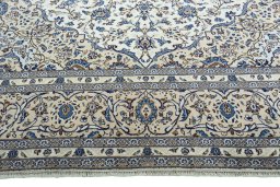 Full view of 2000s Kashan rug from Iran / Persia, 408 × 293 cm in Beige tones