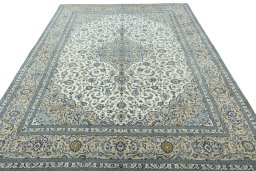 Surface texture of 2000s Kashan rug with natural Wool and intricate pattern