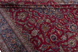 Close-up detail of 1950s Kashan rug from Iran / Persia showing Wool weave