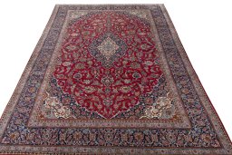 Surface texture of 1950s Kashan rug with natural Wool and intricate pattern