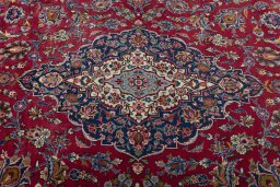 Central medallion detail of 1950s Kashan rug from Iran / Persia