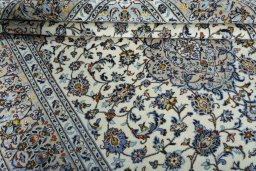 Close-up detail of 2000s Kashan rug from Iran / Persia showing Wool weave