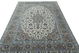 Surface texture of 2000s Kashan rug with natural Wool and intricate pattern