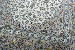 Close-up detail of 2000s Kashan rug from Iran / Persia showing Wool weave