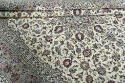 Close-up detail of 2000s Kashan rug from Iran / Persia showing Wool weave