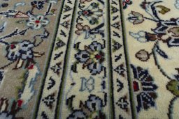 Central medallion detail of 2000s Kashan rug from Iran / Persia