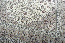 Close-up detail of 2000s Kashan rug from Iran / Persia showing Wool weave
