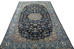 Surface texture of 1970s Kashan rug with natural Wool and intricate pattern