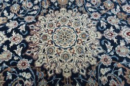 Central medallion detail of 1970s Kashan rug from Iran / Persia