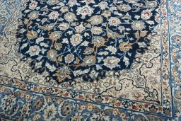 Close-up detail of 1970s Kashan rug from Iran / Persia showing Wool weave