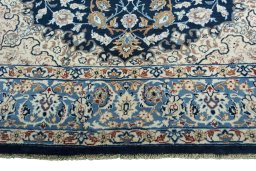 Full view of 1970s Kashan rug from Iran / Persia, 356 × 217 cm in Blue tones