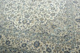 Close-up detail of 2000s Kashan rug from Iran / Persia showing Wool weave
