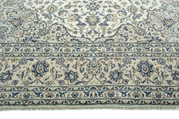 Full view of 2000s Kashan rug from Iran / Persia, 403 × 294 cm in Beige tones