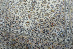 Close-up detail of 2000s Kashan rug from Iran / Persia showing Wool weave