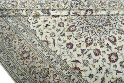 Close-up detail of 2000s Kashan rug from Iran / Persia showing Wool weave