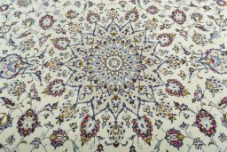 Central medallion detail of 2000s Kashan rug from Iran / Persia