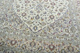 Close-up detail of 2000s Kashan rug from Iran / Persia showing Wool weave
