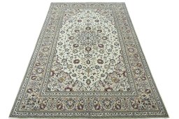 Surface texture of 2000s Kashan rug with natural Wool and intricate pattern