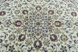 Central medallion detail of 2000s Kashan rug from Iran / Persia