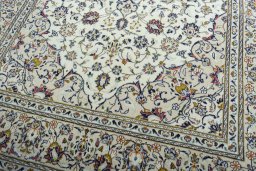 Close-up detail of 2000s Kashan rug from Iran / Persia showing Wool weave