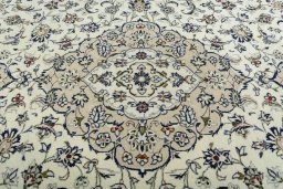 Central medallion detail of 2000s Kashan rug from Iran / Persia