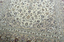 Close-up detail of 2000s Kashan rug from Iran / Persia showing Wool weave