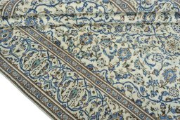 Close-up detail of 2000s Kashan rug from Iran / Persia showing Wool weave