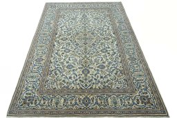 Surface texture of 2000s Kashan rug with natural Wool and intricate pattern