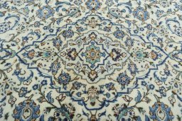 Central medallion detail of 2000s Kashan rug from Iran / Persia