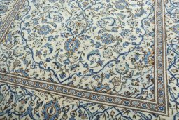 Close-up detail of 2000s Kashan rug from Iran / Persia showing Wool weave