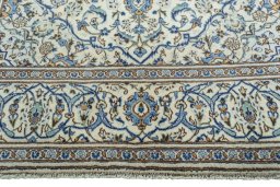Full view of 2000s Kashan rug from Iran / Persia, 295 × 200 cm in Beige tones