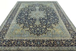Surface texture of 2000s Kashan rug with natural Cork and intricate pattern