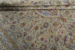 Close-up detail of 2000s Kashan rug from Iran / Persia showing Wool weave