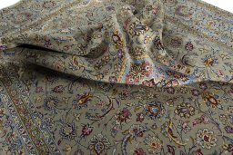 Surface texture of 2000s Kashan rug with natural Wool and intricate pattern