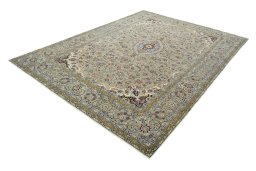 Corner detail of 2000s Kashan rug showing border pattern and Wool pile
