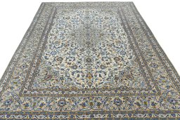 Surface texture of 2000s Kashan rug with natural Wool and intricate pattern
