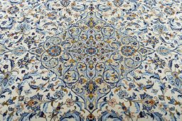 Central medallion detail of 2000s Kashan rug from Iran / Persia