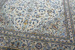 Close-up detail of 2000s Kashan rug from Iran / Persia showing Wool weave