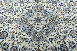 Central medallion detail of 2000s Kashan rug from Iran / Persia