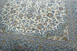 Close-up detail of 2000s Kashan rug from Iran / Persia showing Wool weave