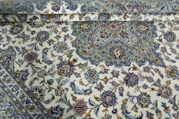 Close-up detail of 2000s Kashan rug from Iran / Persia showing Wool weave