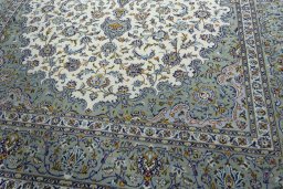 Close-up detail of 2000s Kashan rug from Iran / Persia showing Wool weave